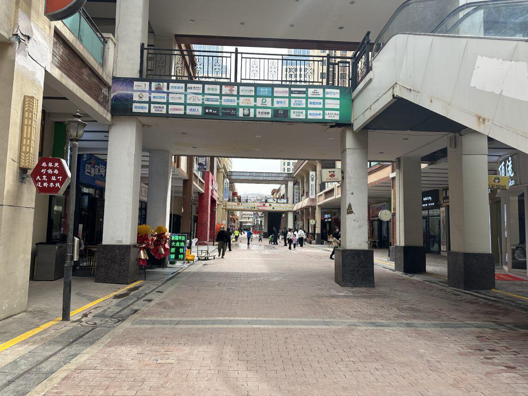 广场路1号,万达金街商铺 亏本出售5